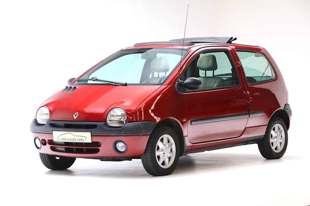 Exterior shot of a red Renault Twingo 1998 compact hatchback car.