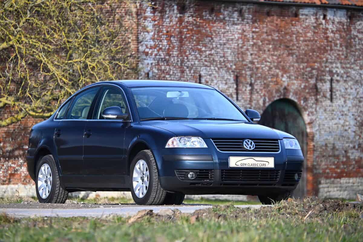 Exterior shot of a blue Volkswagen Passat parked outdoors.