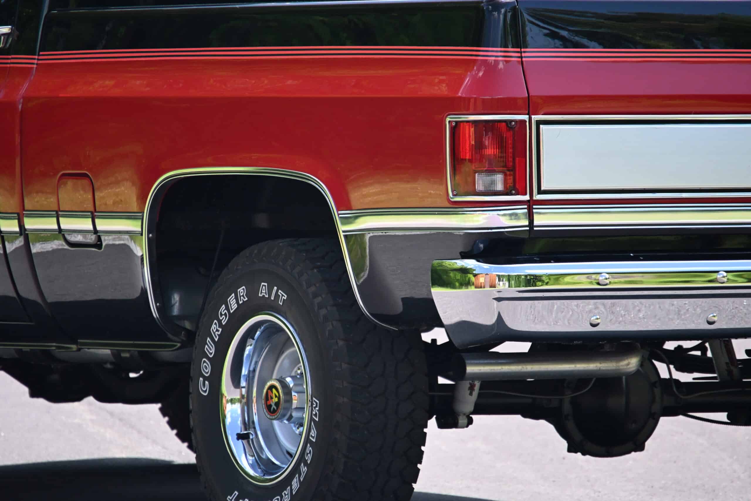 1986 Chevrolet SILVERADO — Rear view of a classic car with chrome bumper and tire.