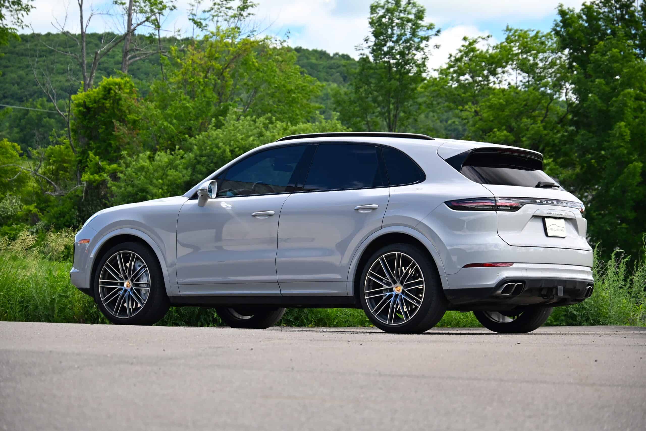 2022 Porsche Cayenne — Exterior view of a silver classic car SUV on the road.