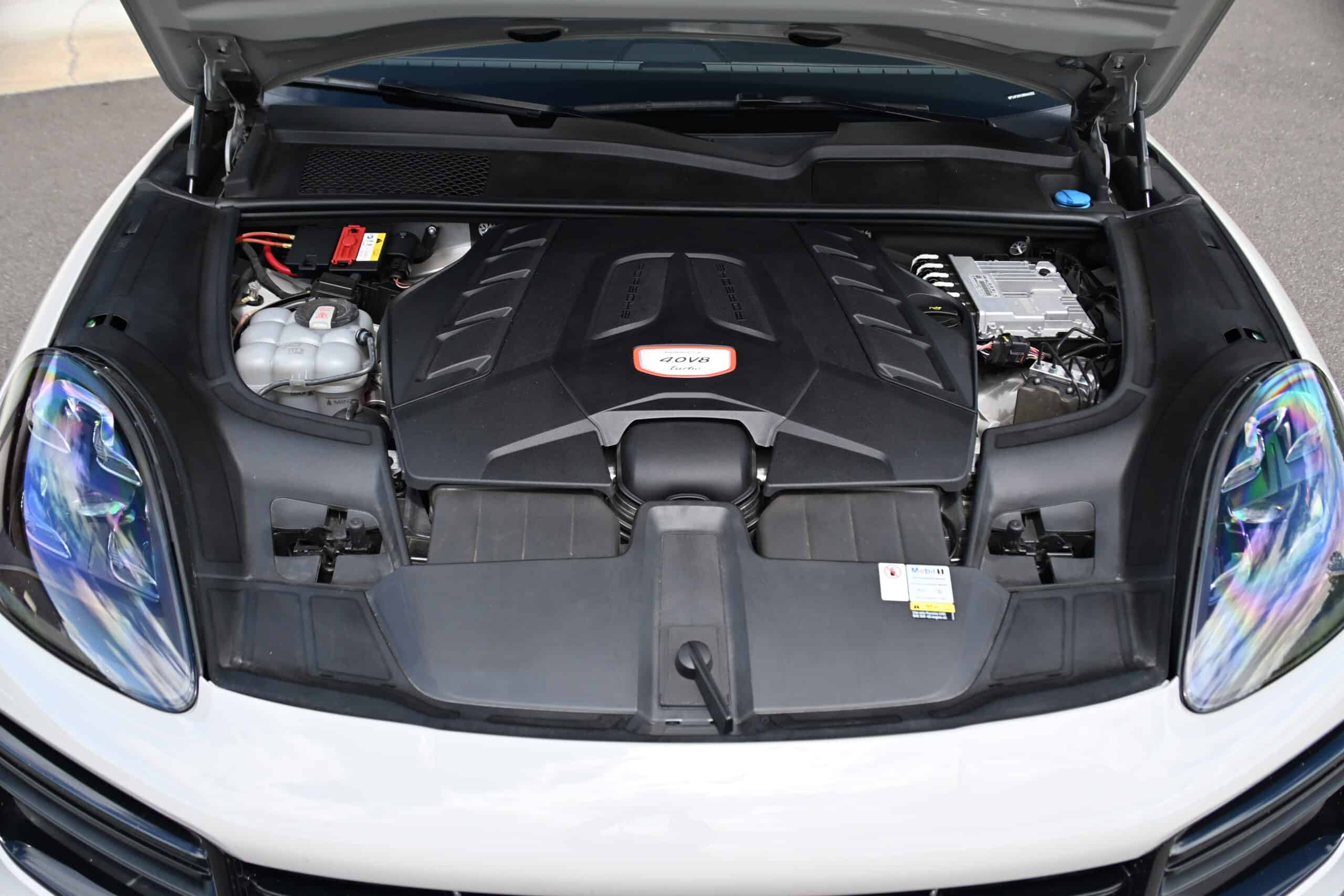2022 Porsche Cayenne — Engine bay of a classic car with V8 engine and visible components.