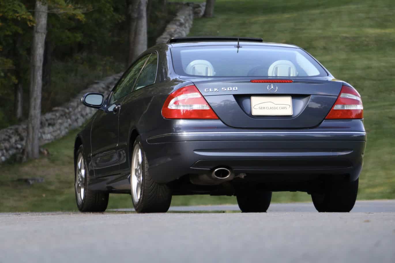 1999 Mercedes CLK500 — Rear view of a black classic car with convertible body style.