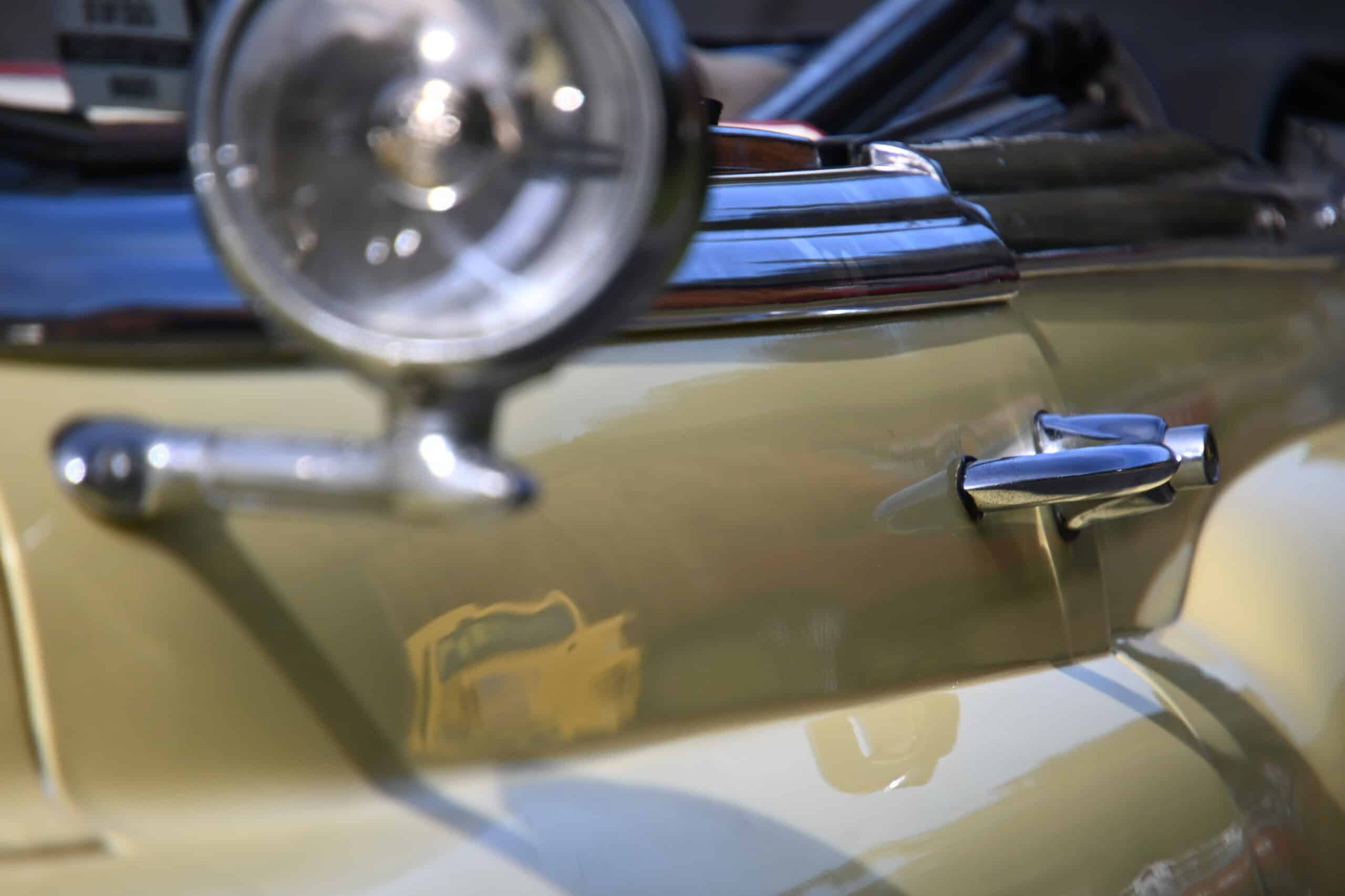 1953 Buick special — Close-up of classic car door and chrome details.