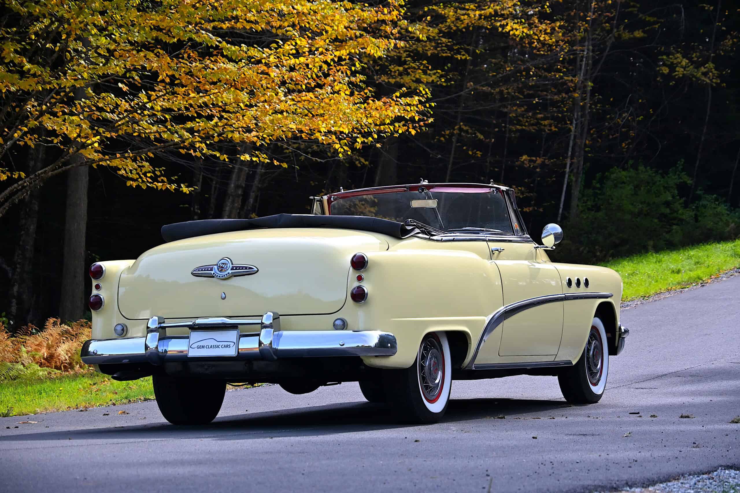 1953 Buick special — Exterior shot of a classic car with cream body and black roof.