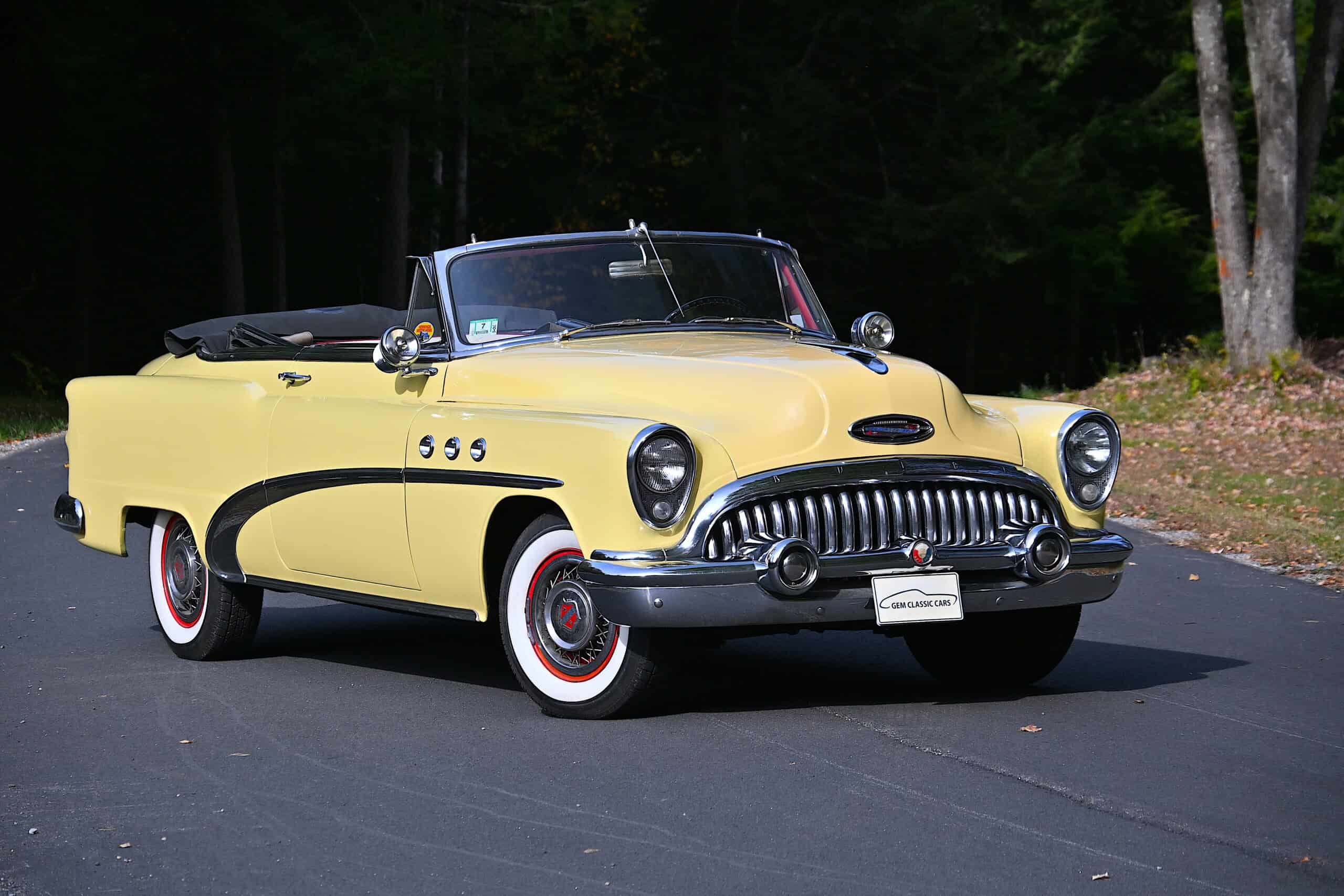 1953 Buick special — Yellow classic car convertible with black interior and chrome details.