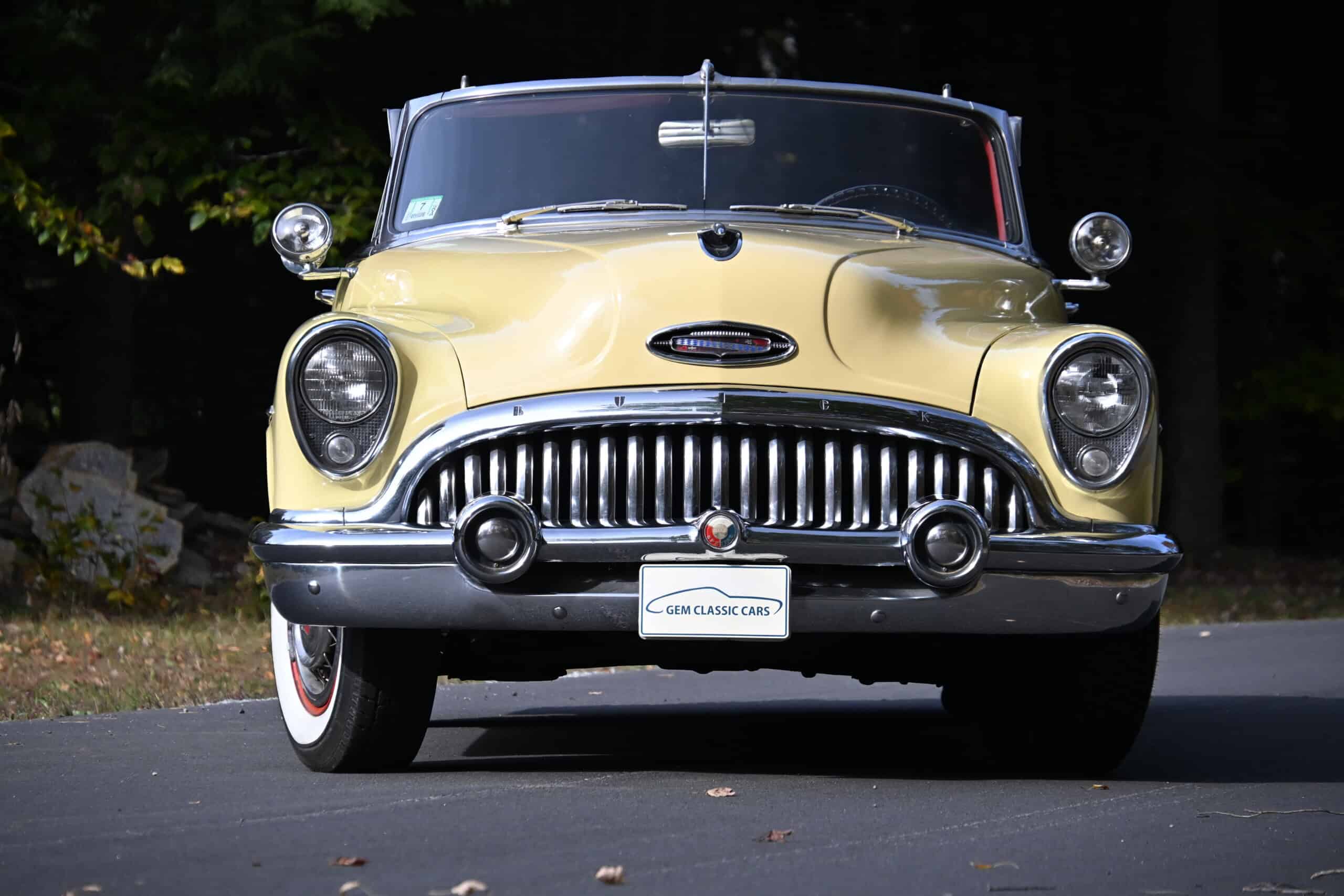 1953 Buick special — Exterior shot of a classic car with yellow body and chrome details.
