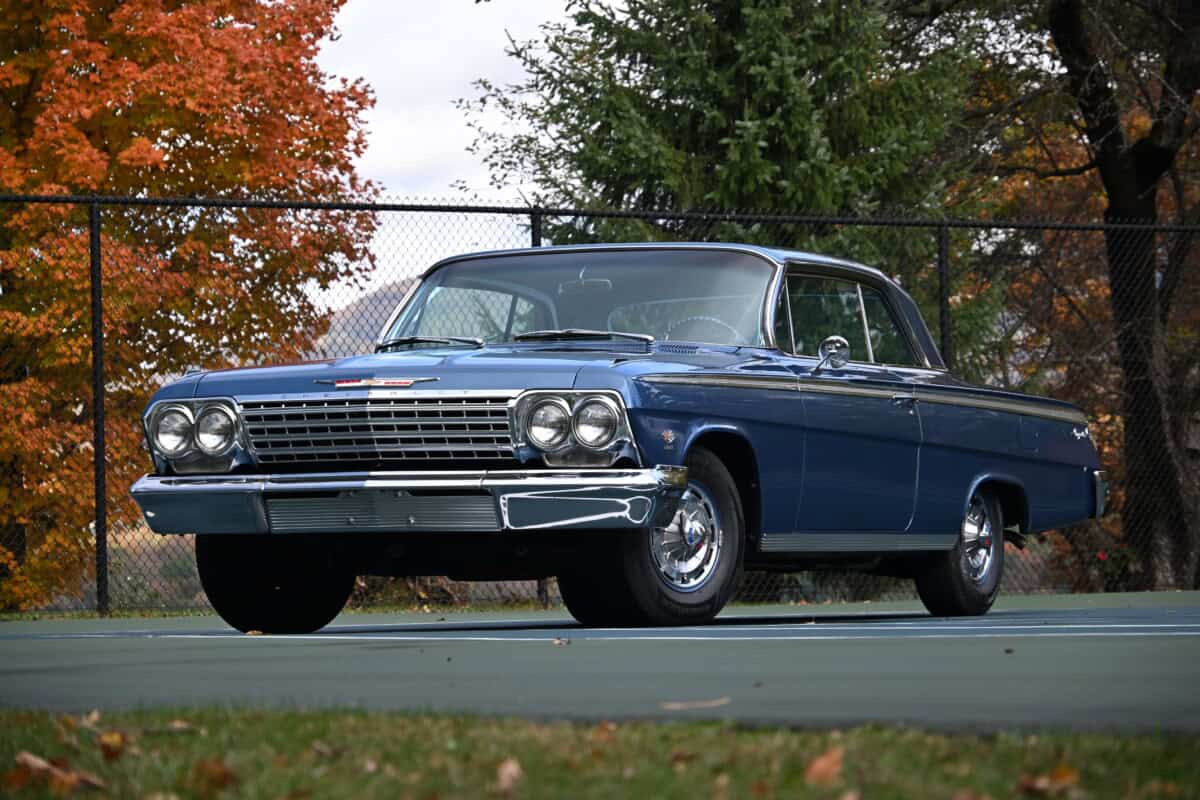 1962 Chevrolet impala ss 409 — Exterior shot of a classic car with blue body and chrome details.