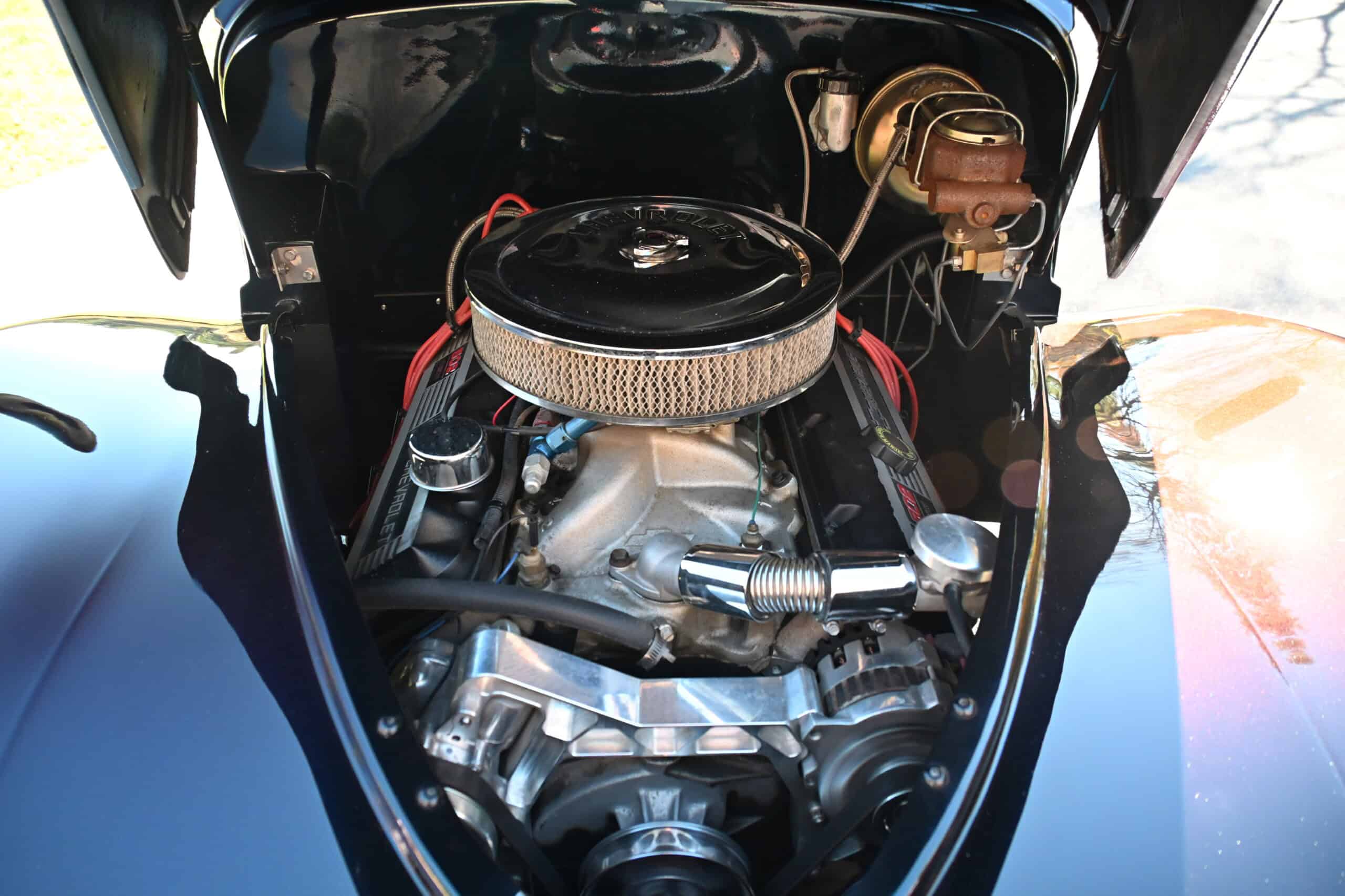 1941 Willys Custom Street Rod — Close-up of classic car engine with air filter and components.