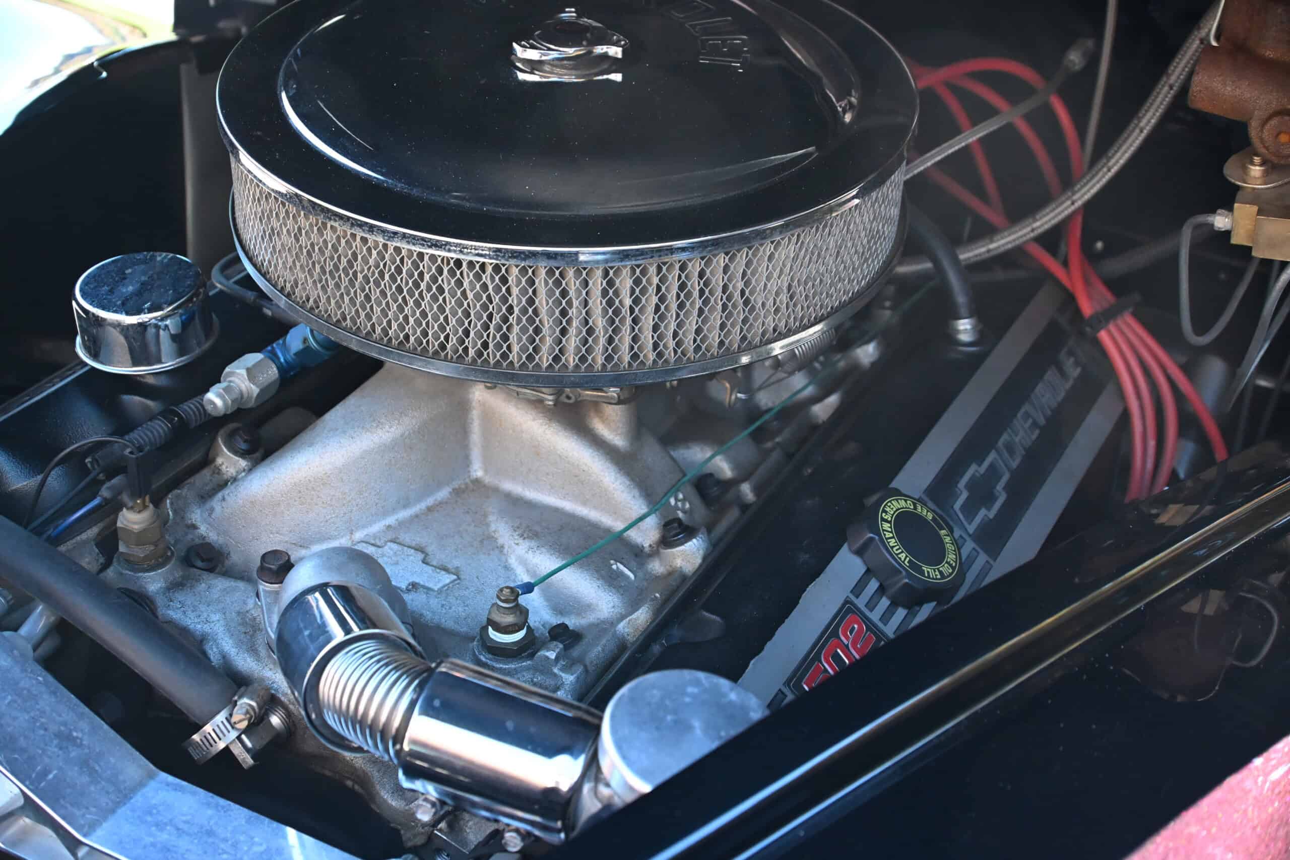 1941 Willys Custom Street Rod — Close-up of classic car engine with air filter and visible parts.