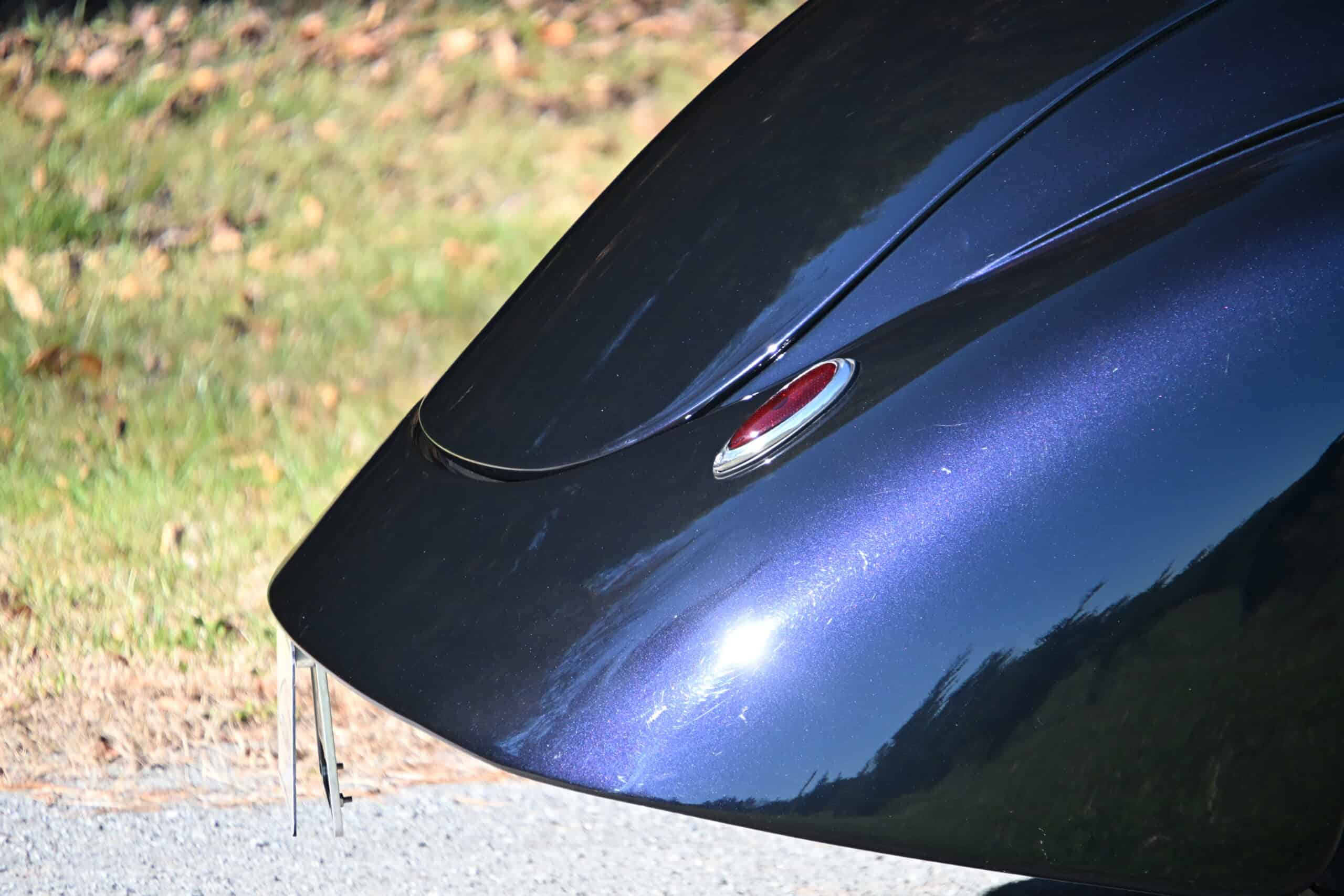 1941 Willys Custom Street Rod — Close-up of classic car rear with shiny blue exterior and red taillight.