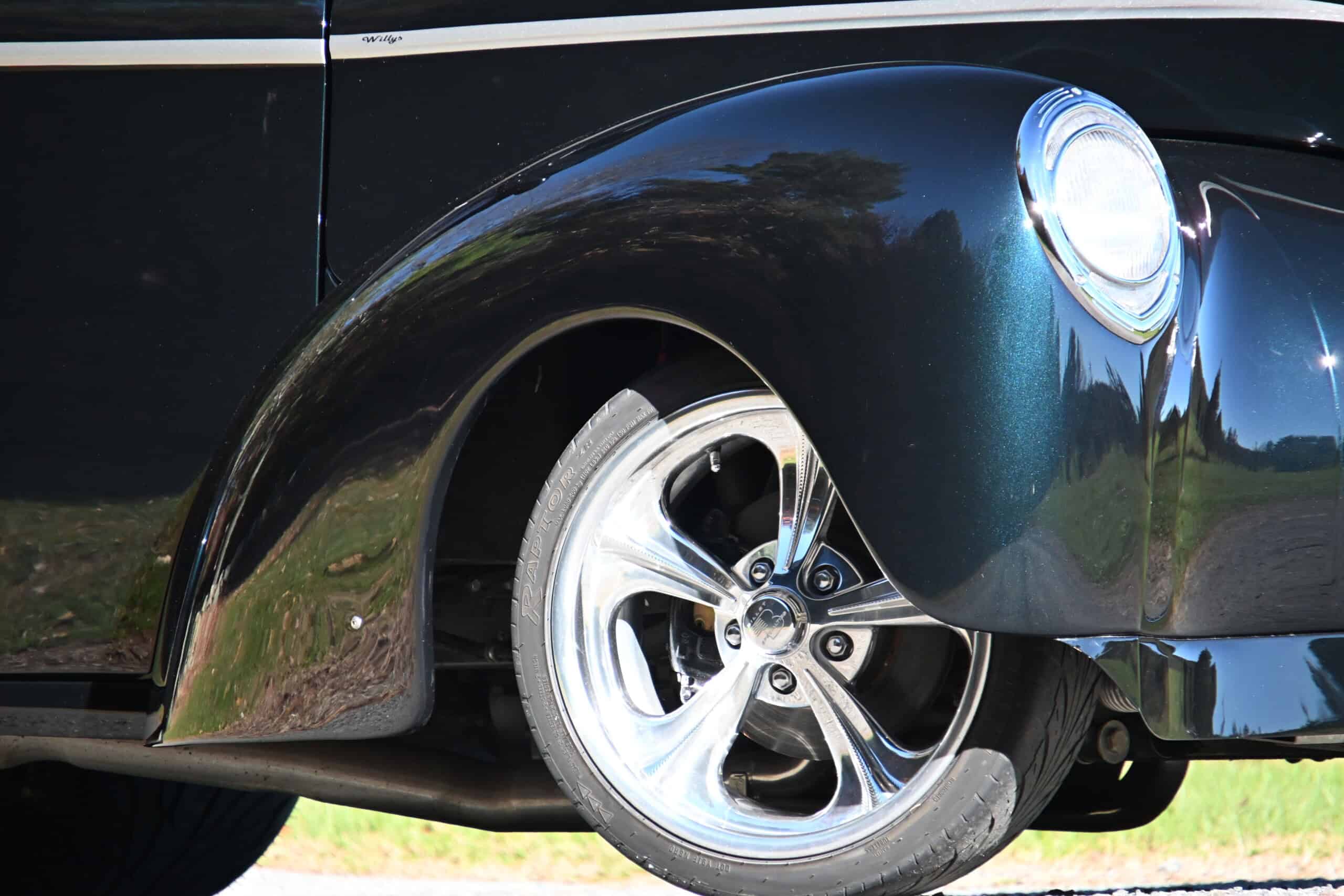 1941 Willys Custom Street Rod — Close-up of classic car with black body and alloy wheel.