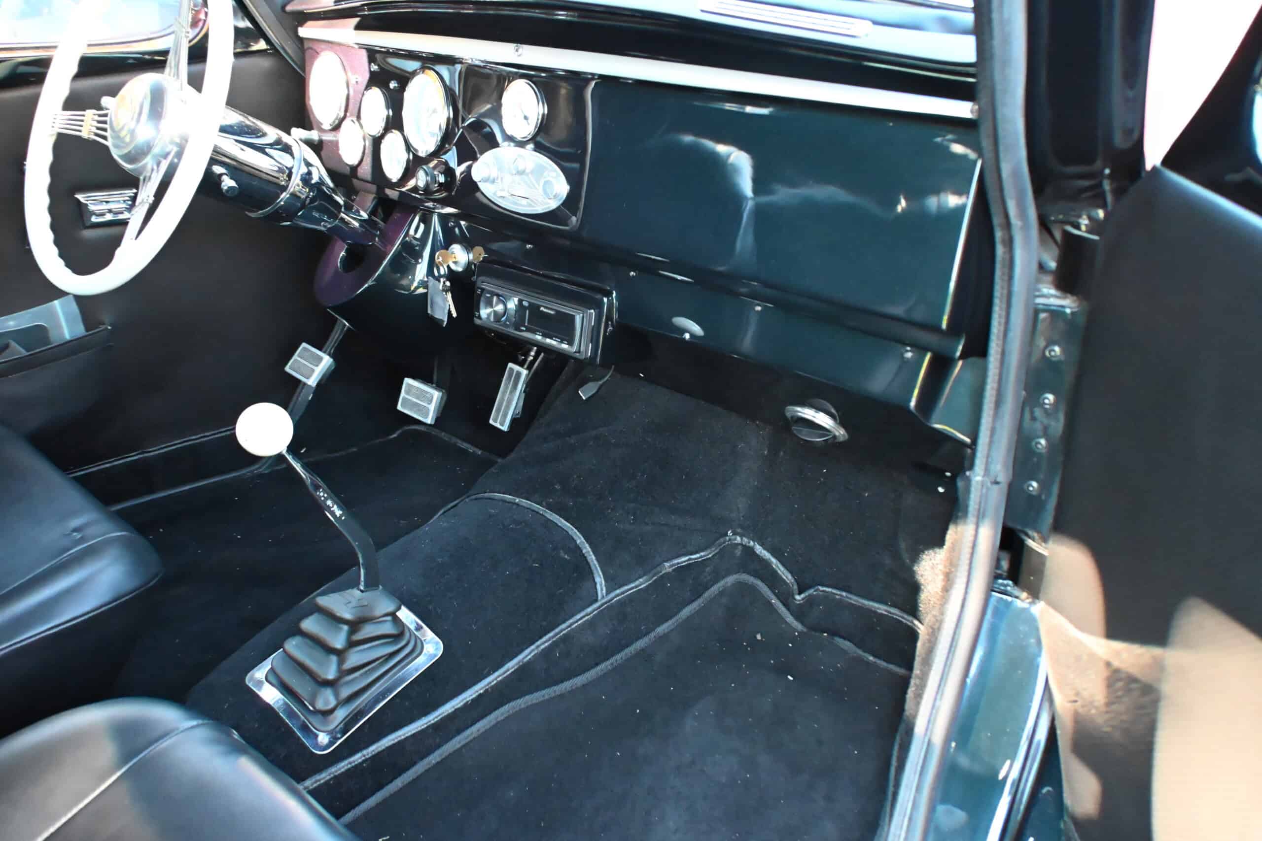 1941 Willys Custom Street Rod — Interior shot of a classic car showing dashboard and manual gear shift.