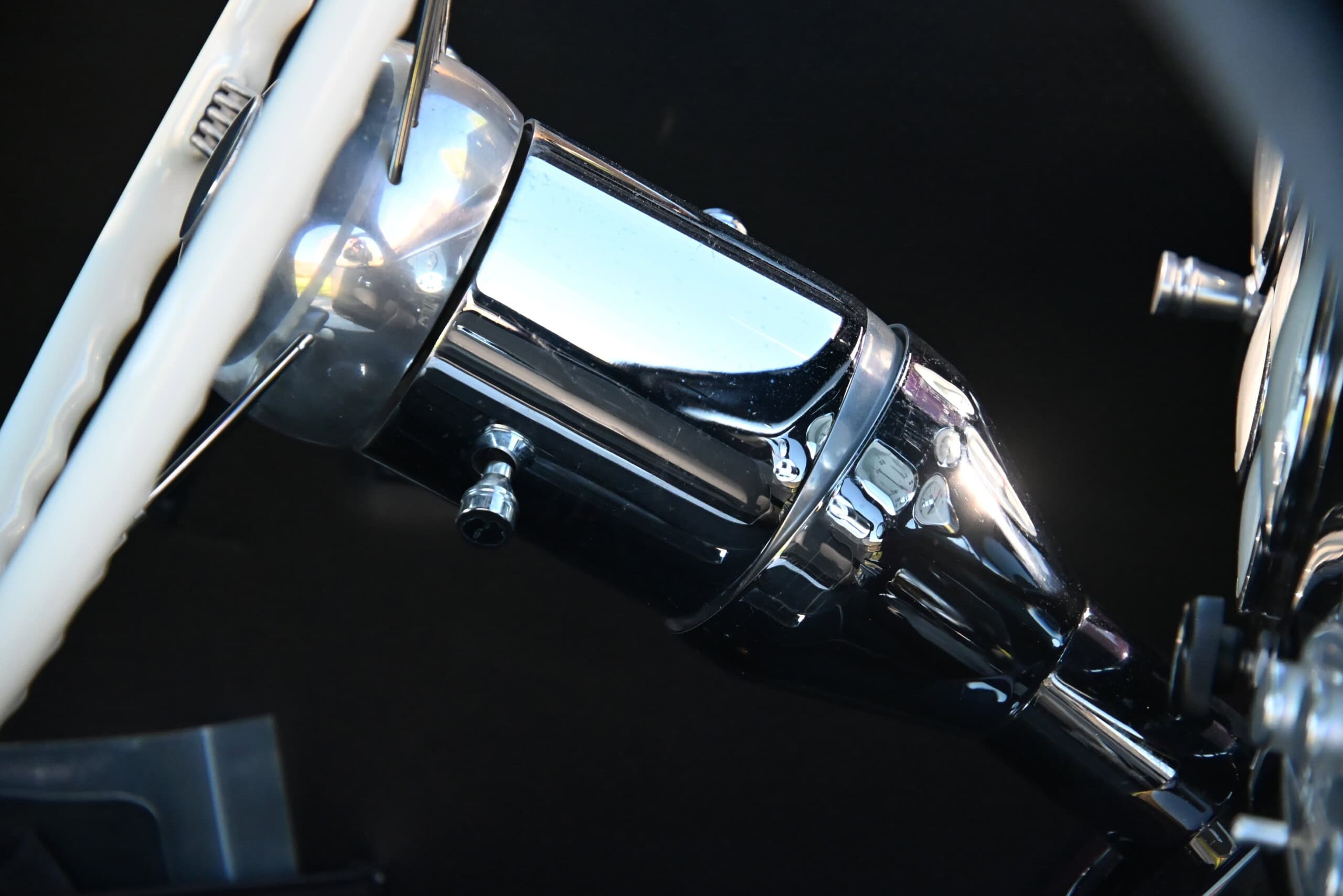 1941 Willys Custom Street Rod — Close-up of classic car gear shift and steering wheel.