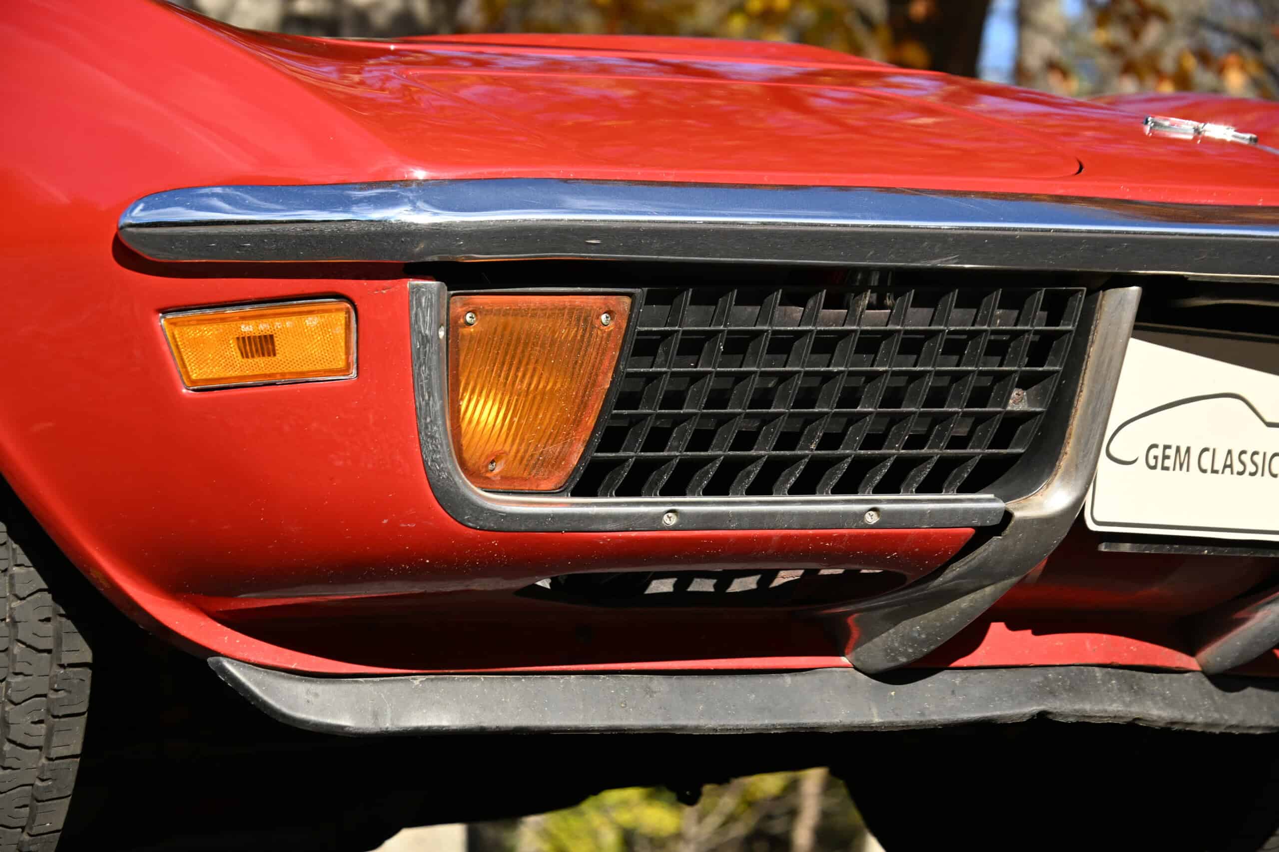 1972 Chevrolet corvette — Close-up of classic car front with grille and bumper details.