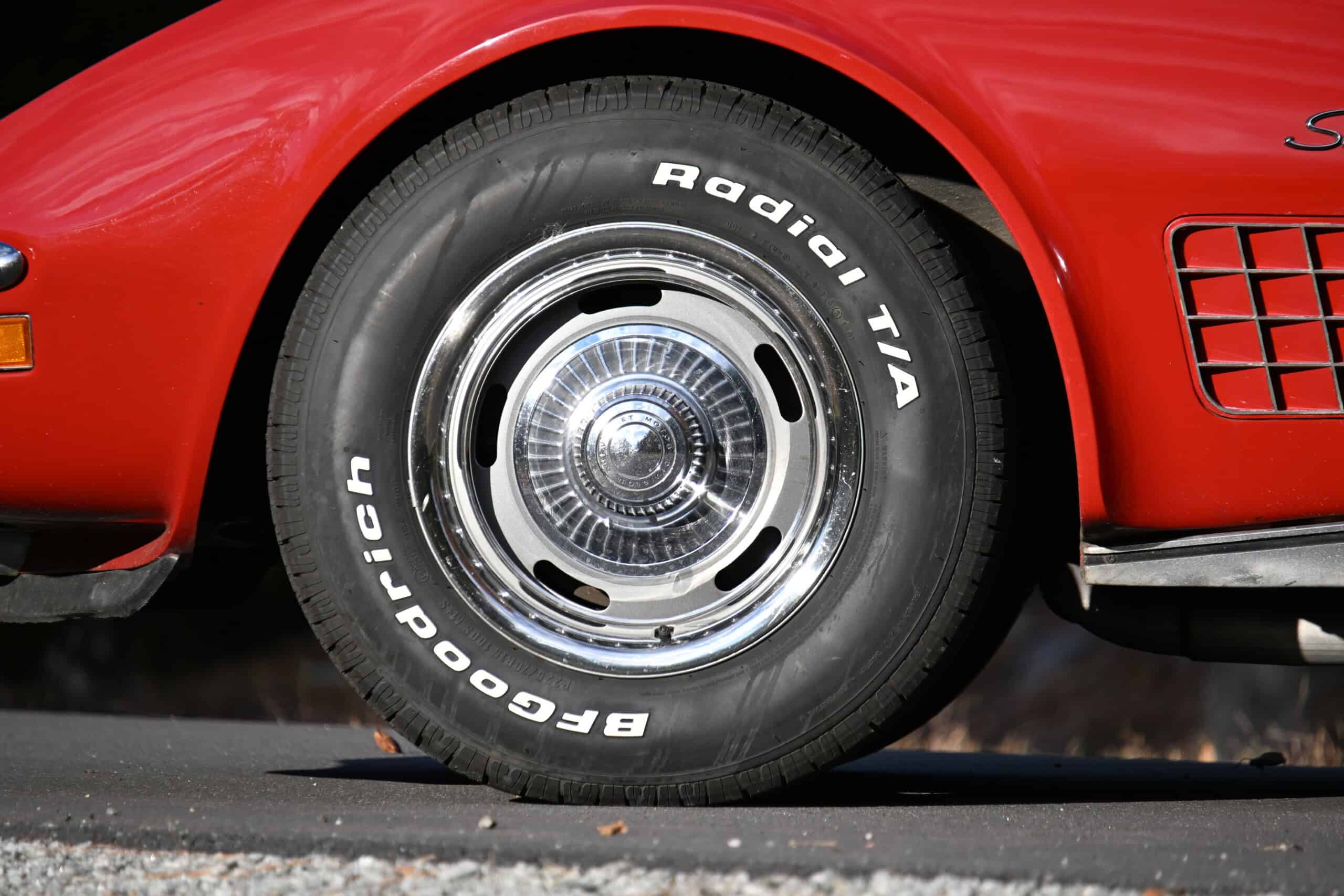 1972 Chevrolet corvette — Close-up of a classic car wheel with chrome hubcap and BFGoodrich tire.