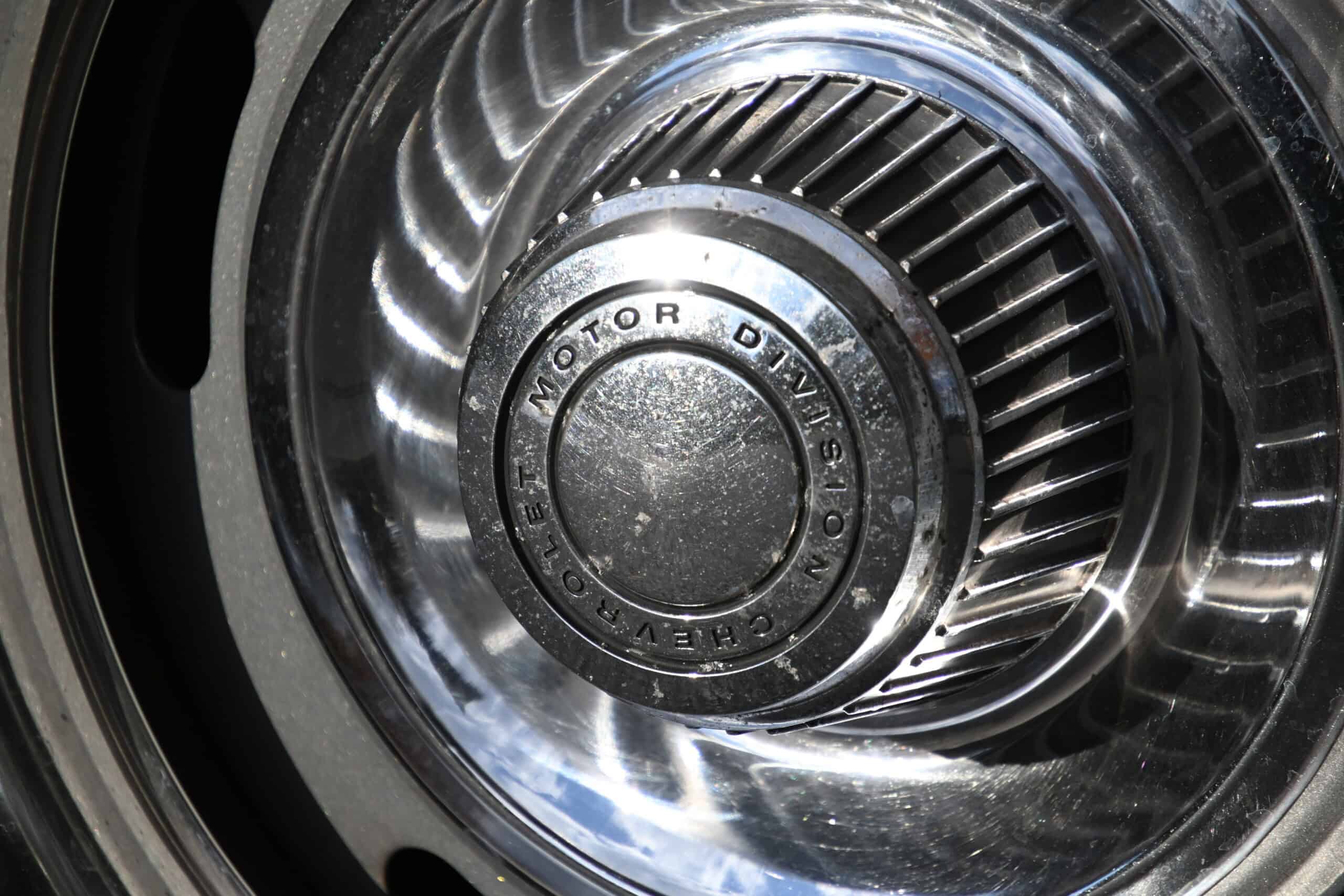 1972 Chevrolet corvette — Close-up of a classic car wheel with chrome rim and hubcap.