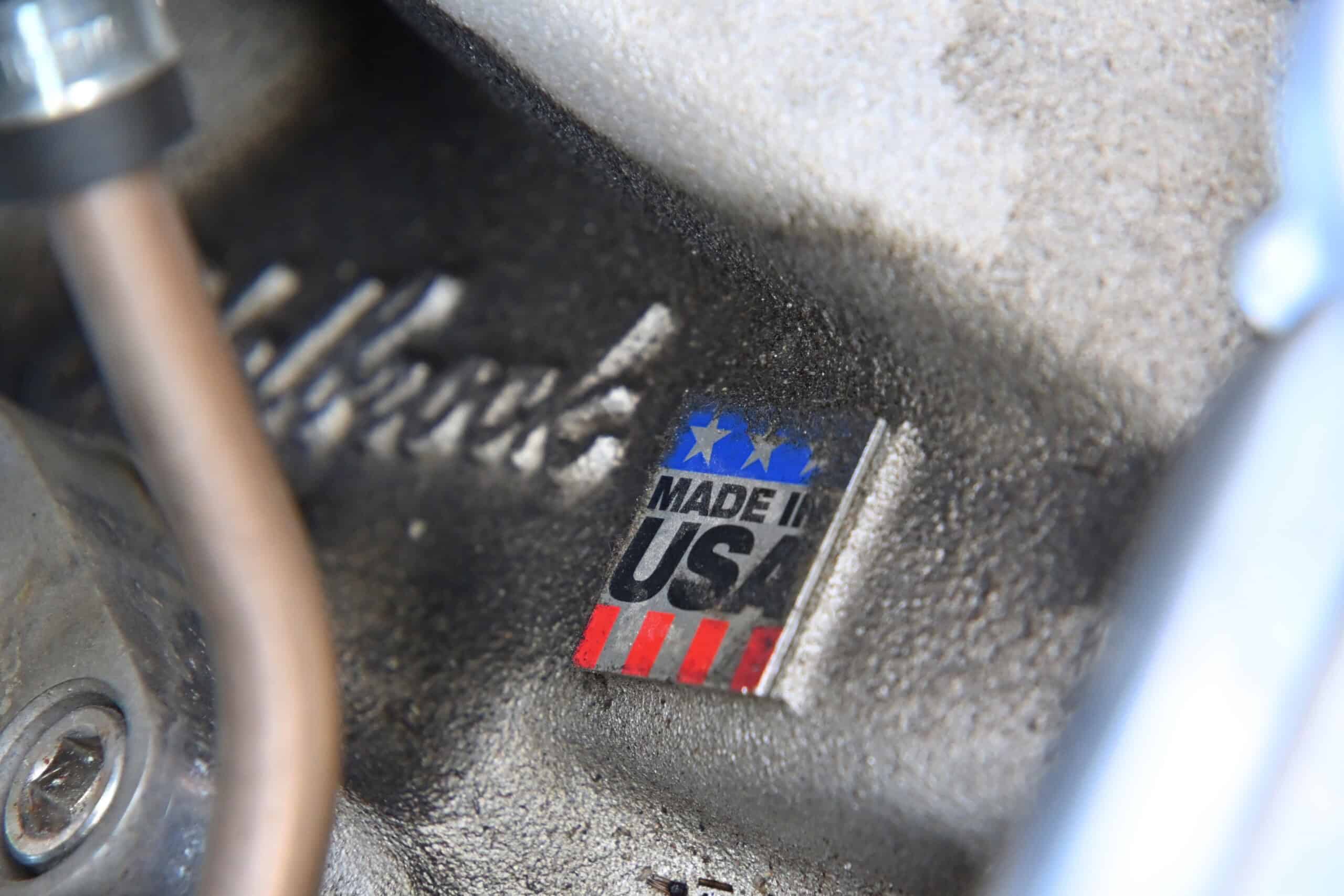 1972 Chevrolet corvette — Close-up of engine with USA made sticker in a classic car.