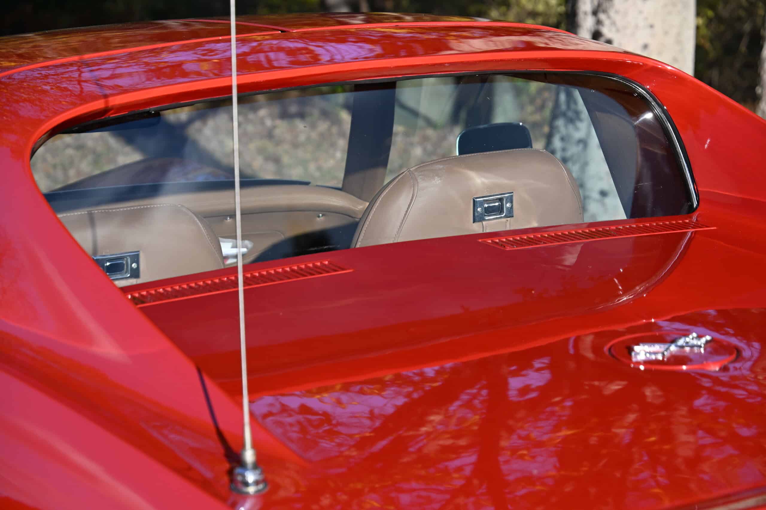 1972 Chevrolet corvette — Exterior view of classic car with rear window and beige interior.