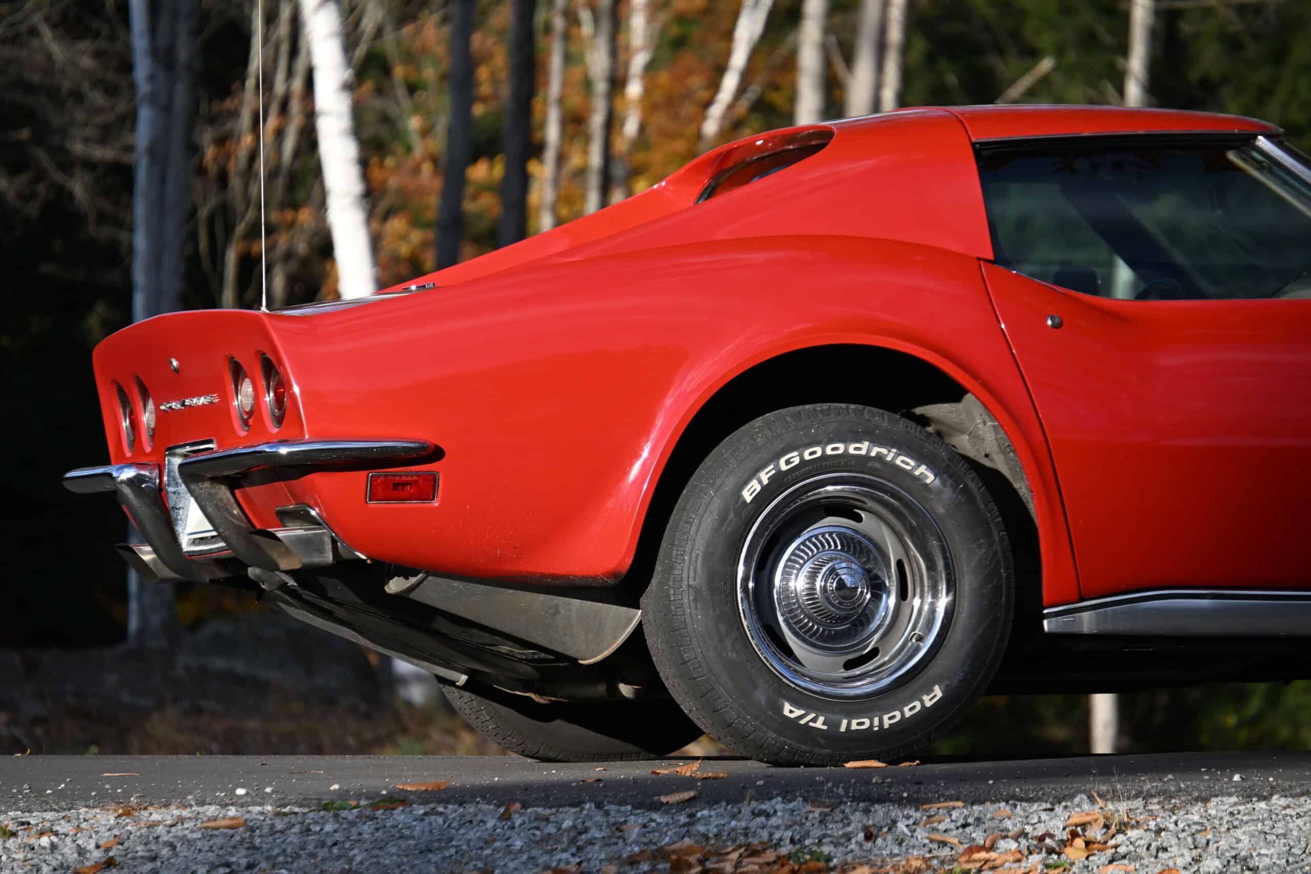 1972 Chevrolet corvette — Red classic car with chrome bumper and BFGoodrich tires.