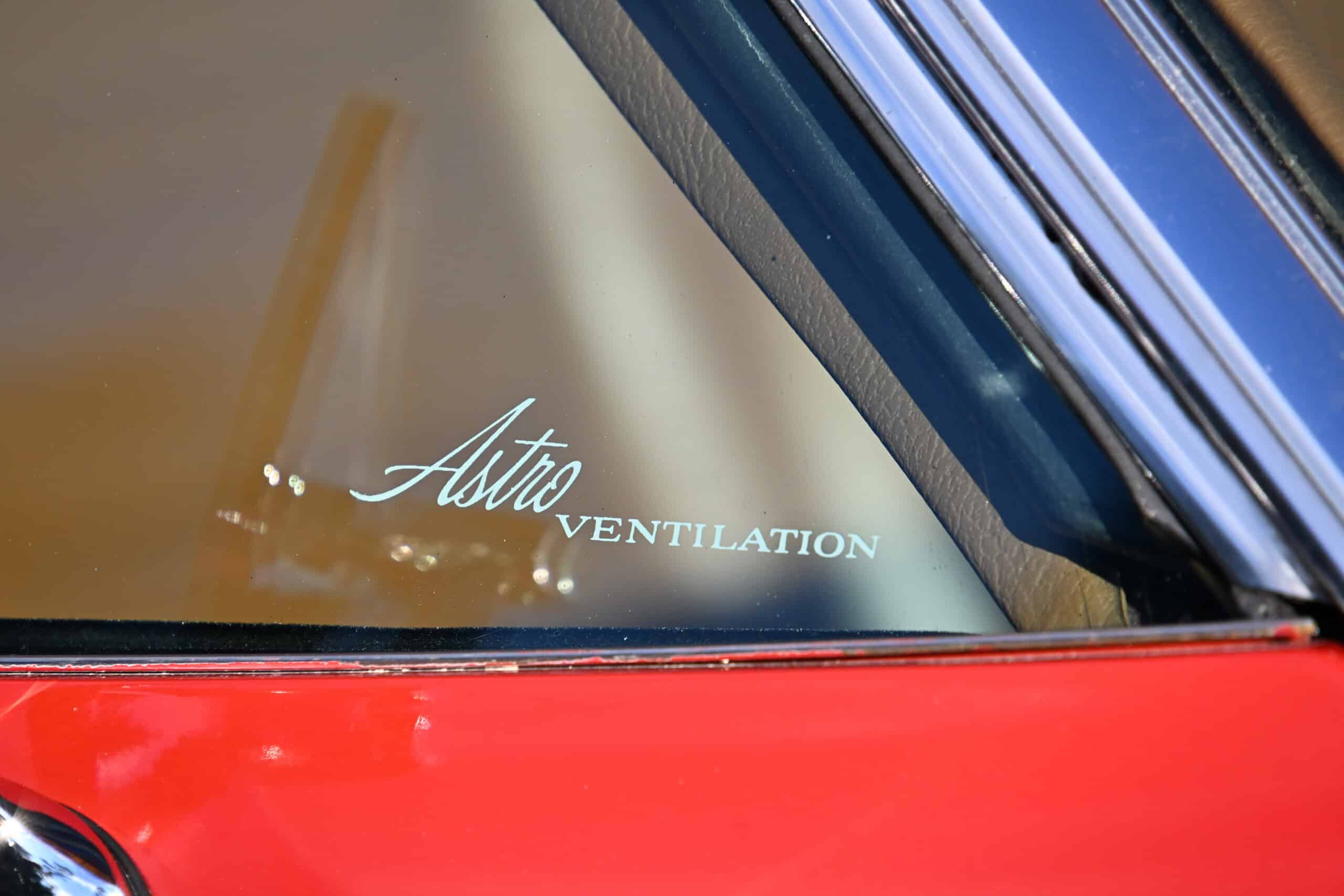 1972 Chevrolet corvette — Close-up of ventilation sticker on classic car windshield.