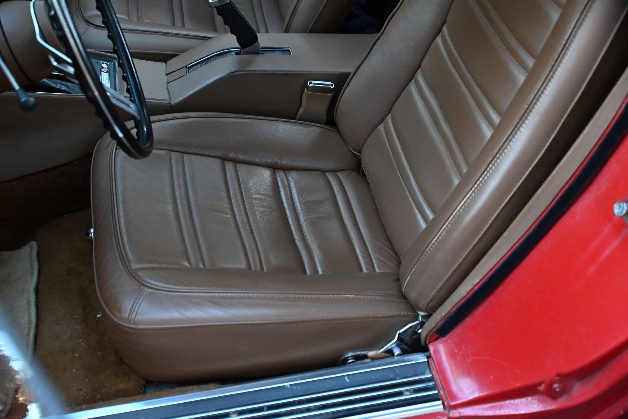 1972 Chevrolet corvette — Close-up of brown leather interior seat in classic car.