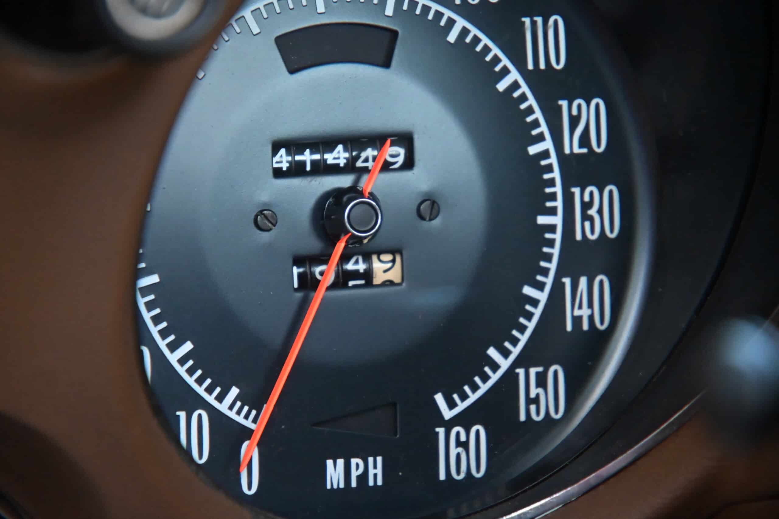 1972 Chevrolet corvette — Close-up of a classic car speedometer showing 0 to 160 MPH.