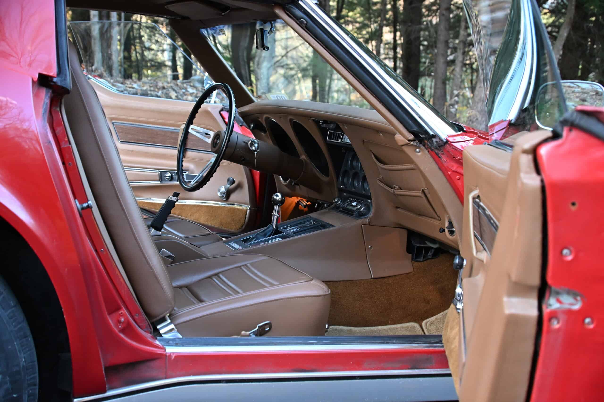 1972 Chevrolet corvette — Interior view of a classic car showing dashboard and tan seats.