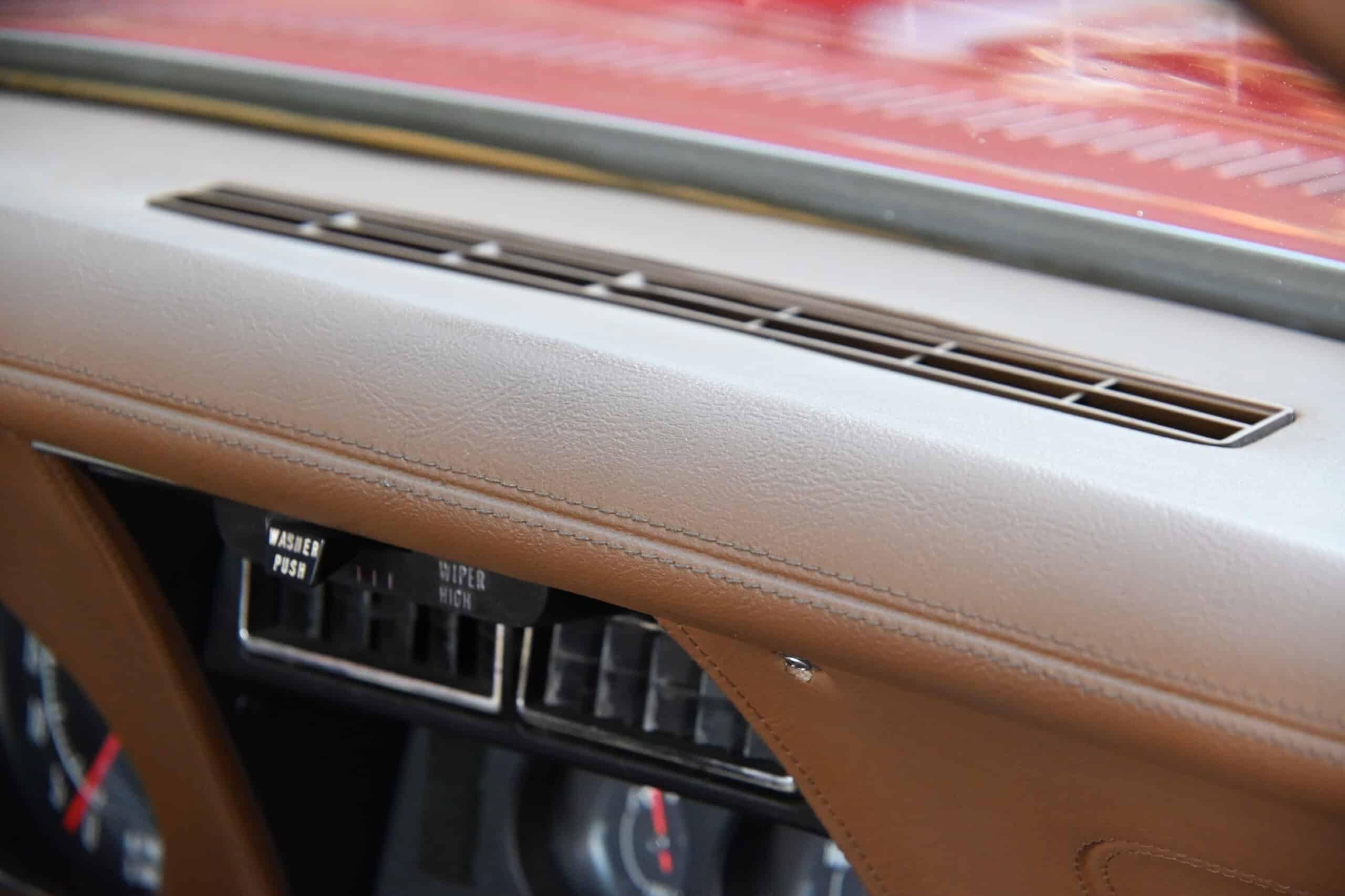 1972 Chevrolet corvette — Interior shot of a classic car dashboard with air vent and controls.