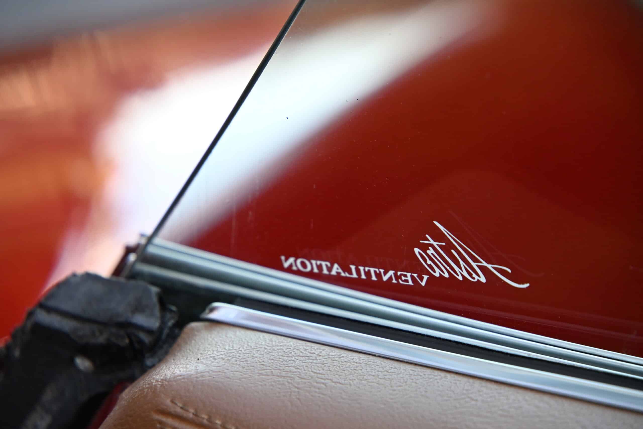 1972 Chevrolet corvette — Close-up of classic car with convertible top and windshield.