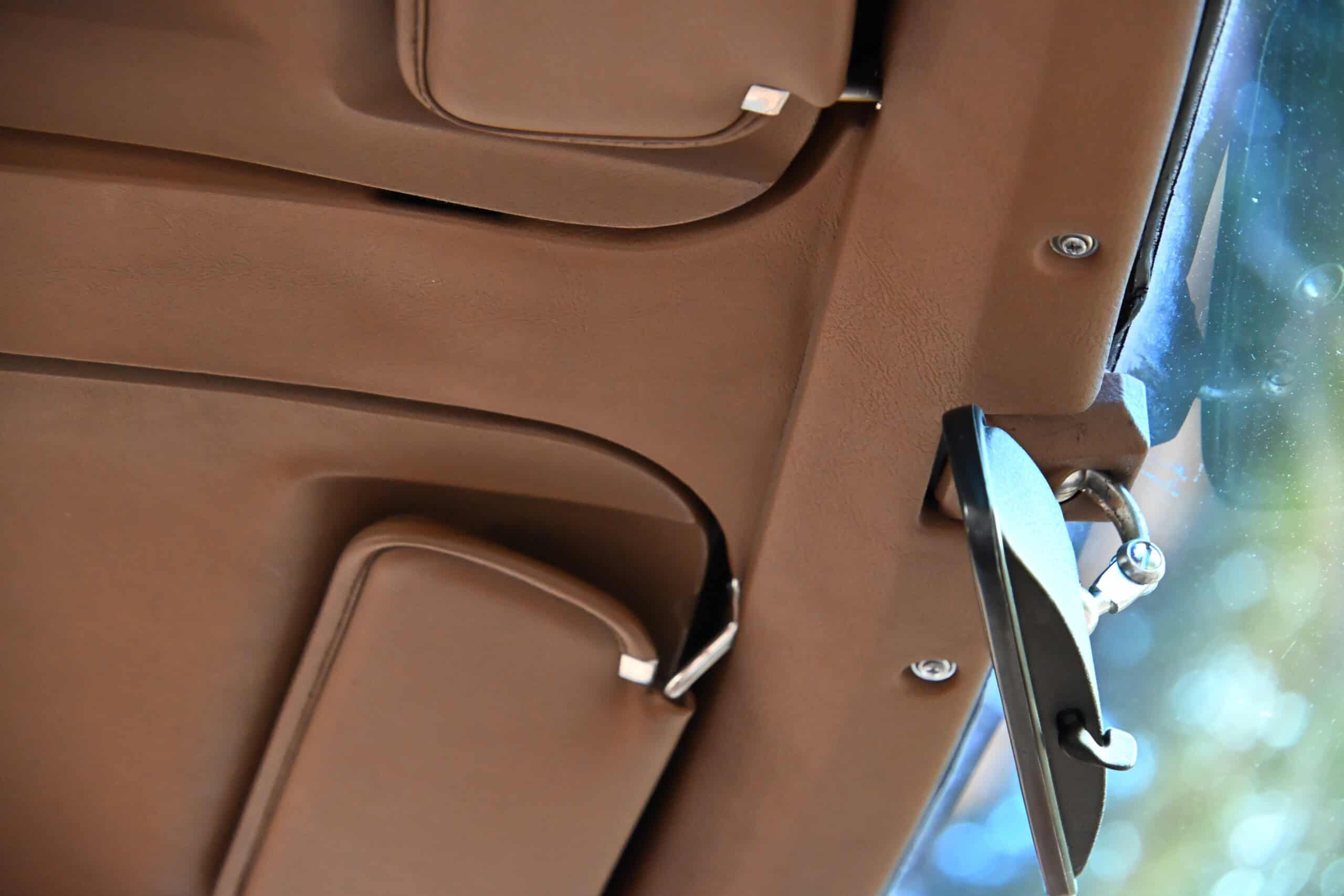 1972 Chevrolet corvette — Interior shot of classic car showing sun visor and headliner.