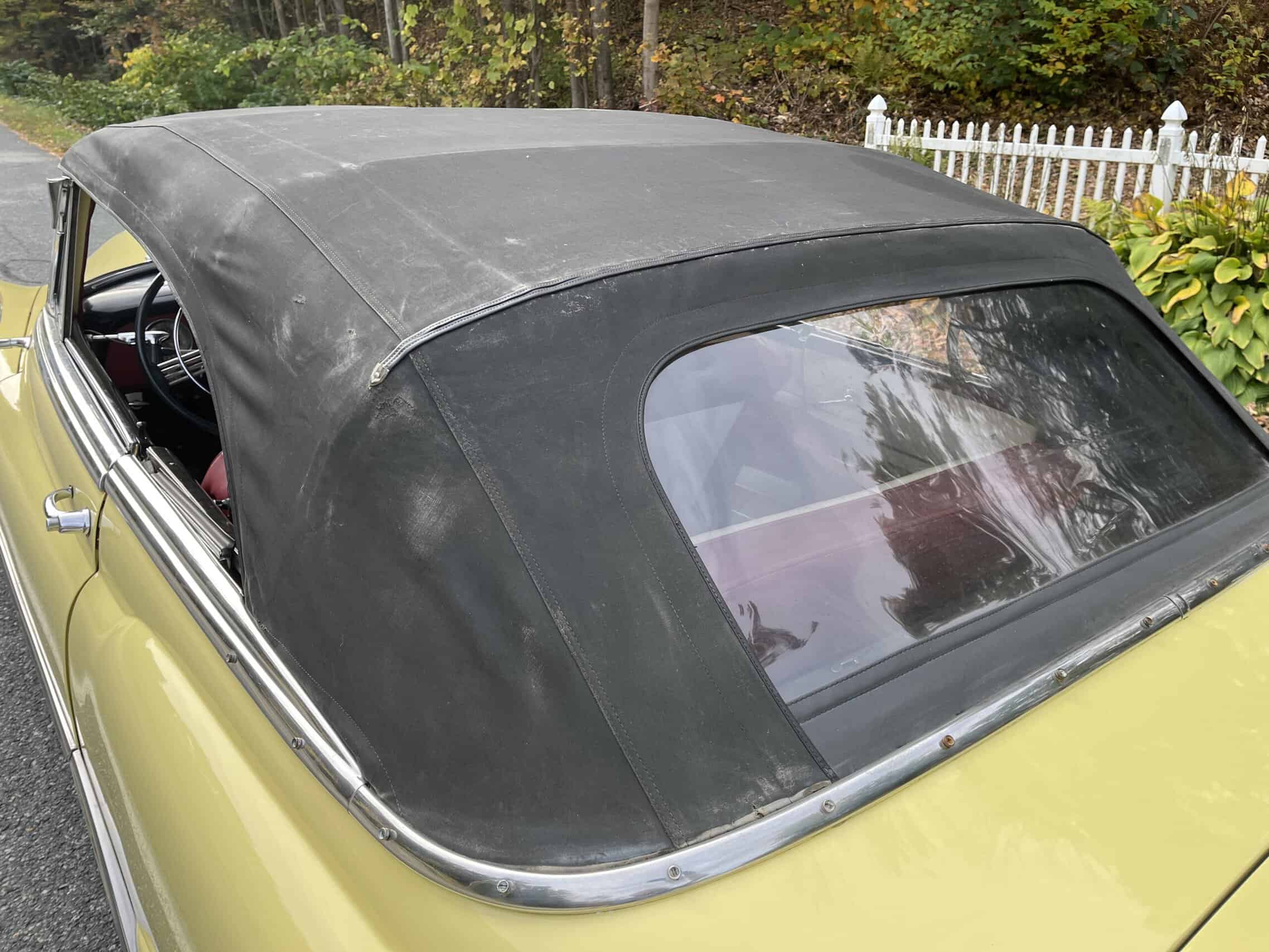1953 Buick special — Exterior view of a classic car with black soft top roof.