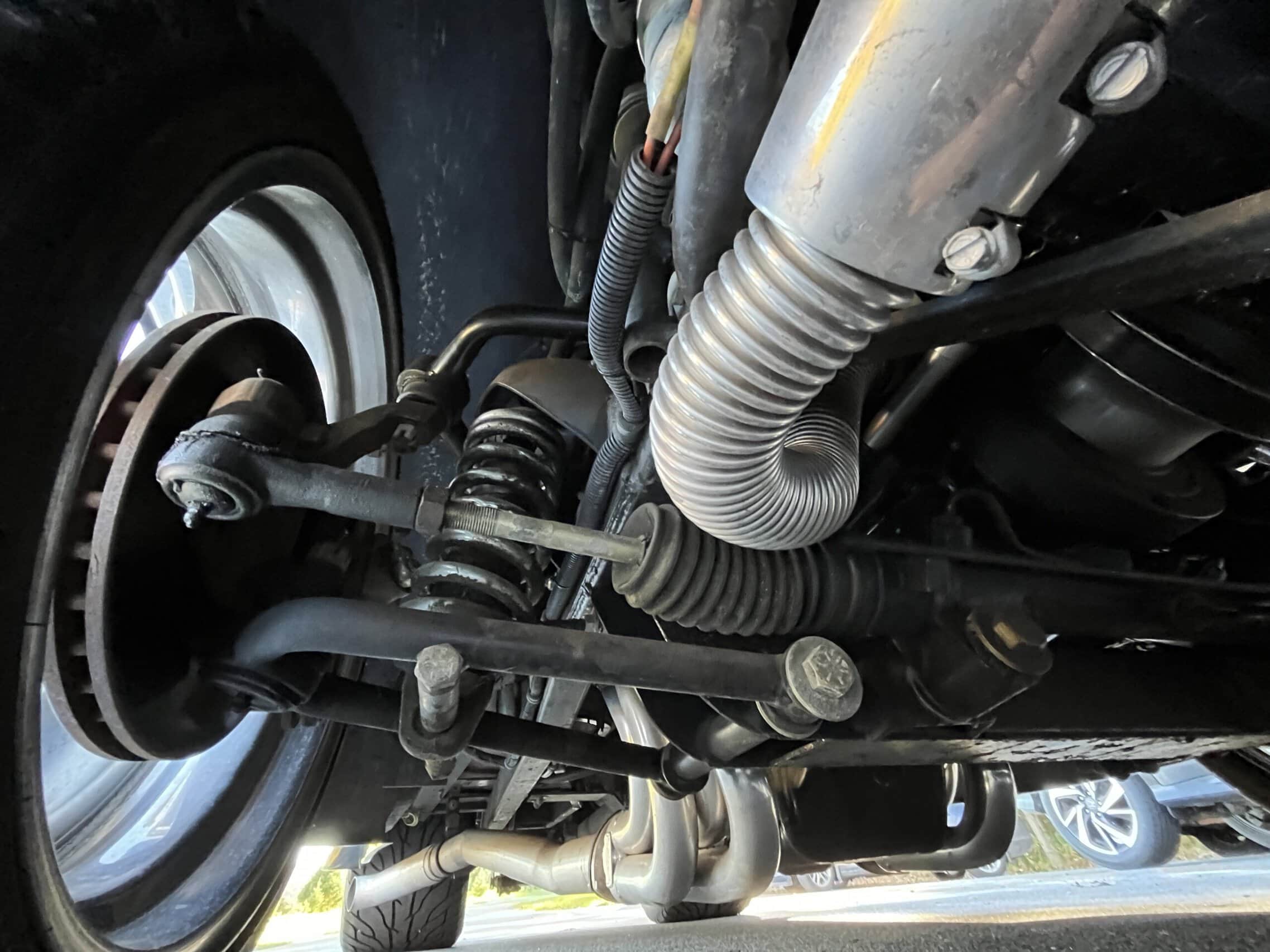 1941 Willys Custom Street Rod — Close-up of engine and suspension in a classic car.