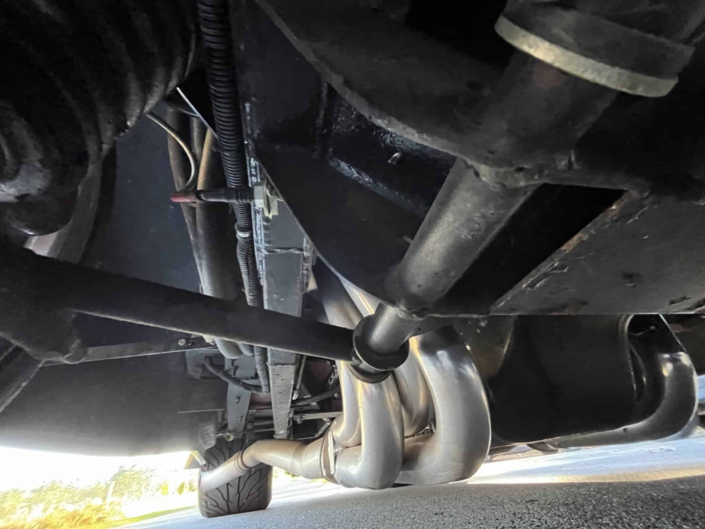 1941 Willys Custom Street Rod — View of exhaust system and undercarriage of a classic car.