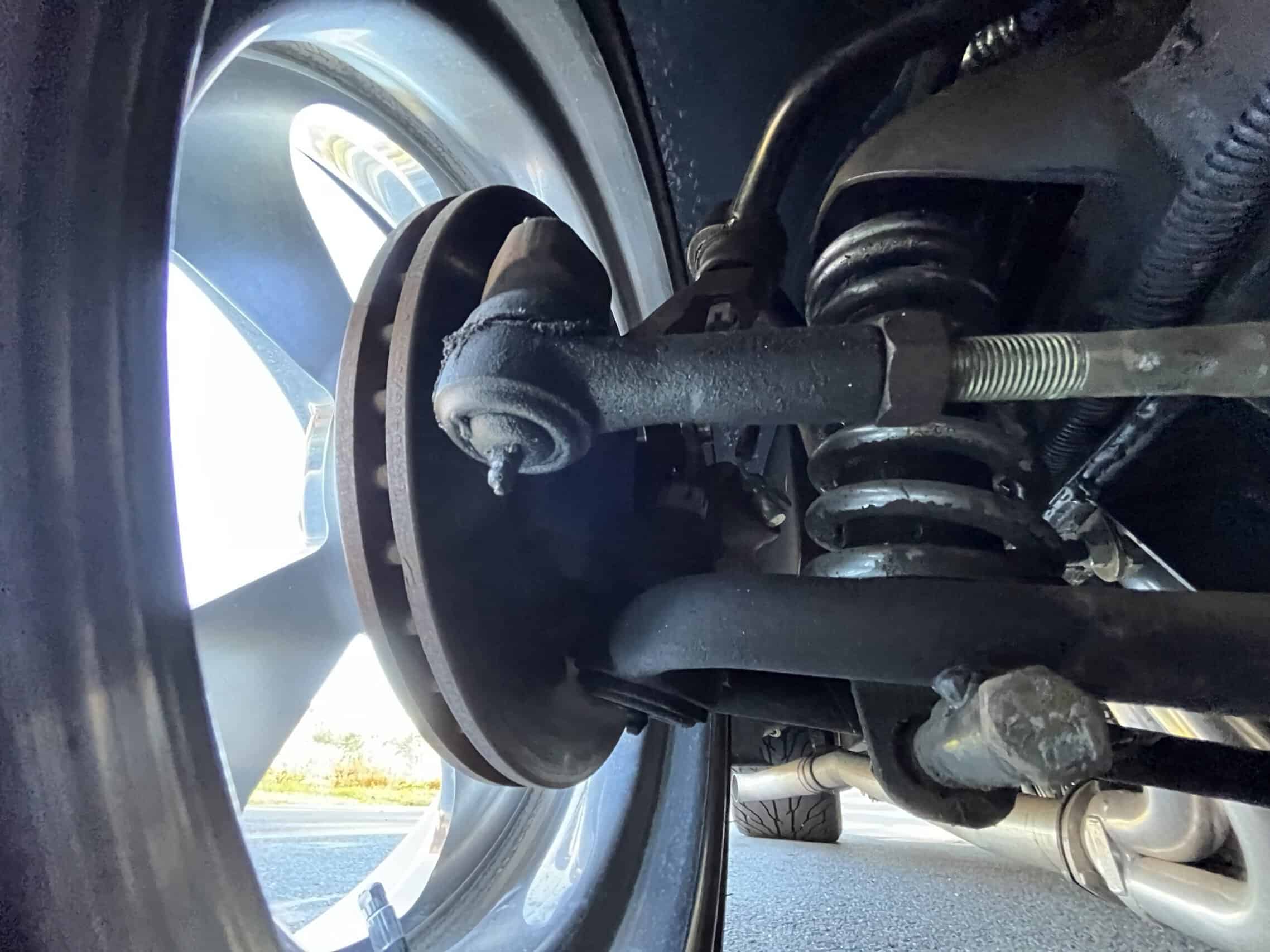1941 Willys Custom Street Rod — Close-up of suspension and wheel of a classic car.