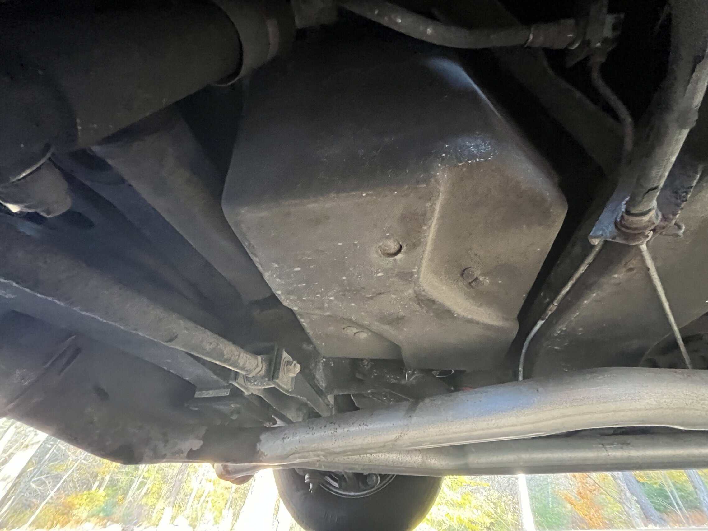 1972 Chevrolet corvette — Underbody shot of a classic car showing engine and exhaust system.